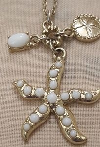 Ann Taylor Gold tone necklace starfish pendan